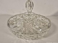 Covered clear glass candy dish, lid on