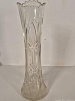 Full view of tall clear cut crystal vase