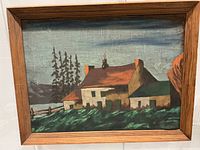 Full view of framed landscape painting