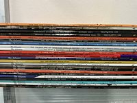 Stack showing spines with issue titles and dates 2024-2026