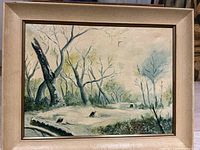 Front view of framed oil painting