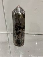 Full view of the amethyst quartz tower standing upright