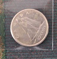 Reverse of 1959 Canadian dime showing Bluenose schooner and denomination