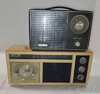 Front view of both radios stacked, showing key features