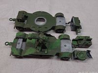 Top and bottom halves of the diecast mobile anti-aircraft unit showing interior and detached parts
