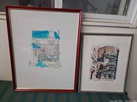 Front view of both framed artworks side by side