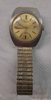 Front view of Gentime wristwatch showing dial, case shape, and stretch band