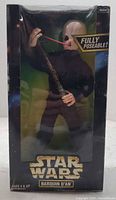 Front view of sealed Barquin D'an action figure box