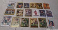 All 18 football cards laid out in three rows