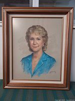 Full view of framed pastel portrait