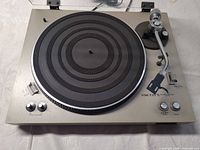 Top view of Scott PS-47A turntable showing platter, controls, and dust cover hinges