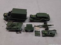 Group shot showing all six Dinky Toys vehicles and accessories