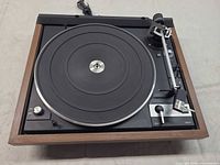 Top view showing full Dual 1241 turntable, platter, tonearm and wood plinth