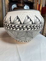 Full side view showing geometric pattern and overall shape