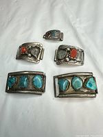 Front view of all five silver pieces showing stones and layout