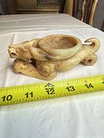 Side view of jade dragon brush washer with tape measure showing length