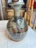 Full side view of vase showing glaze pattern and shape