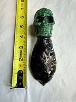 Full dagger beside tape measure showing ~7 in length