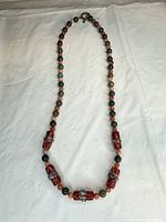 Full view of multicolor lampwork glass bead necklace