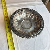 Top view with tape measure showing 10 in diameter of silver-plated compote bowl
