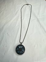 Full view of necklace showing chain length and pendant