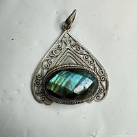 Front view showing labradorite and silver frame