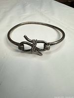 Full view of sterling silver knot bangle bracelet