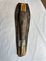 Ice pick in leather sheath full view