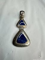 Front view showing full pendant and stones