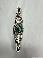 Full brooch on white background