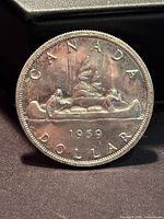 Voyageur reverse showing date and denomination