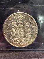 Reverse view, Canadian Coat of Arms, 1963 date, denomination visible