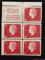Front of booklet pane showing five red 4¢ QEII stamps and bilingual address label