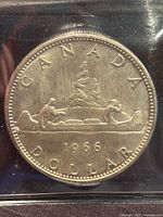 Reverse: CANADA DOLLAR 1966 Voyageur canoe design in ICCS flip