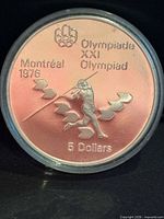 reverse showing javelin athlete design, denomination and Olympic text