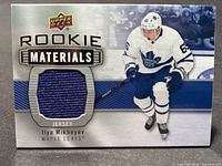 Front of Rookie Materials card showing jersey swatch and player image