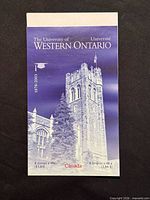 Front cover of the stamp booklet showing title, denomination information and image of University College tower