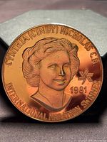 Obverse of medal showing portrait of Cynthia Nicholas with inscriptions