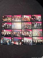 Front view of 16 trading cards arranged in four rows
