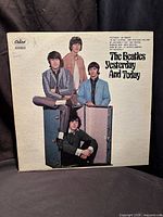 Front cover showing album art, handwriting visible