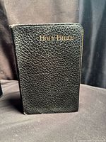 Front cover showing title and leather texture