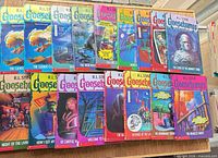 Group shot of all Goosebumps books laid out in two rows