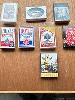 All eight decks laid out on table