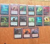 Front view of 15 toploaders containing 30 MTG cards