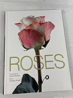 Front cover showing title "ROSES" and single rose image