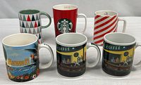Six Starbucks mugs group shot