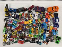 Overhead view of entire assortment of toy vehicles