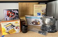Overview of all boxed and unboxed items on shelf