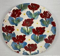 Front view of round platter showing full floral pattern