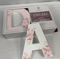 Box showing letter D and product label DREAM